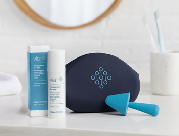 Via™ Starter Kit featuring a 30ml Via bottle, flexible silicone applicator, and smooth-touch pouch for vaginal hydration